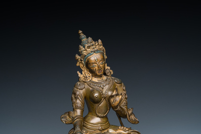 A Sino-Tibetan gilt bronze Tara, 17/18th C.