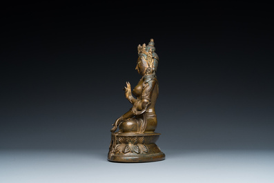 A Sino-Tibetan gilt bronze Tara, 17/18th C.