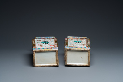 A pair of rectangular Chinese famille rose relief-molded vases, 19th C.