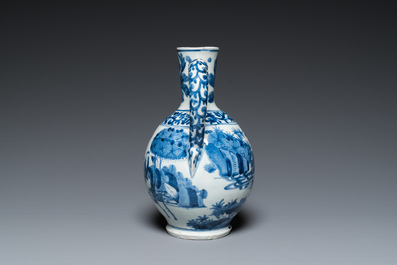 A Japanese blue and white jug with figures in a landscape, Edo, 17th C.