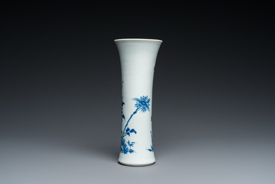 A Chinese blue and white vase with birds in a blossoming setting, Transitional period