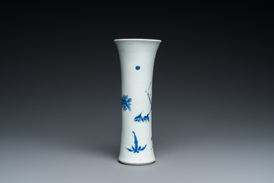 A Chinese blue and white vase with birds in a blossoming setting, Transitional period