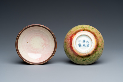 A Chinese peachbloom-glazed seal paste box, Kangxi mark, 19th C.