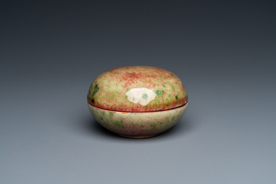 A Chinese peachbloom-glazed seal paste box, Kangxi mark, 19th C.