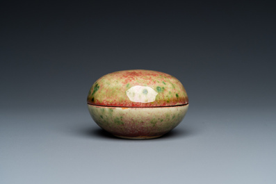 A Chinese peachbloom-glazed seal paste box, Kangxi mark, 19th C.