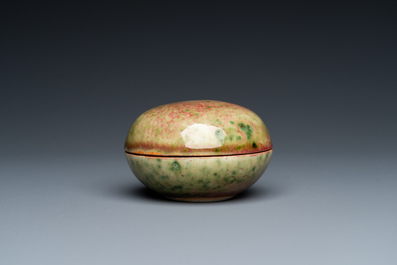 A Chinese peachbloom-glazed seal paste box, Kangxi mark, 19th C.