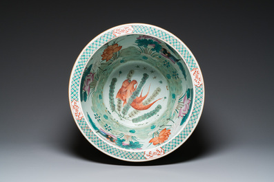 A large Chinese famille verte light blue-ground fish bowl, 19th C.