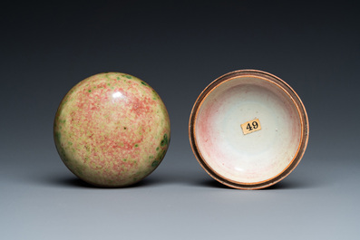 A Chinese peachbloom-glazed seal paste box, Kangxi mark, 19th C.