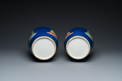 A pair of Chinese famille verte powder-blue-ground vases, 19th C.