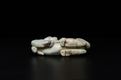 A Chinese greyish green jade 'horse and monkey' carving, probably Ming