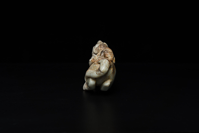 A Chinese greyish green jade 'horse and monkey' carving, probably Ming