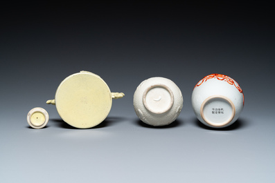 A Chinese yellow-glazed biscuit teapot, a white-glazed biscuit double gourd vase and an iron-red 'phoenix' jar, 20th C.