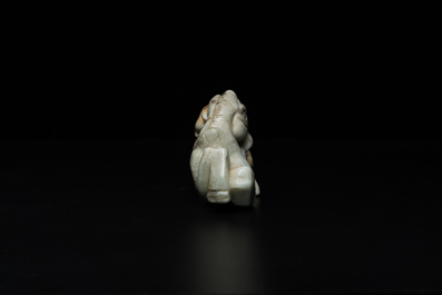 A Chinese greyish green jade 'horse and monkey' carving, probably Ming