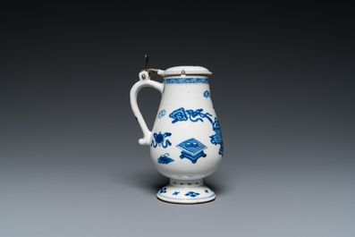 A Chinese silver-mounted blue and white mustard jar and cover, Kangxi