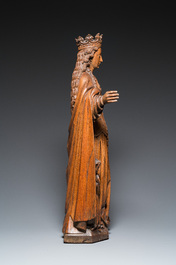 A large Flemish oak sculpture of Ursula with eight virgins, probably Malines, 16th C.