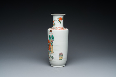 A Chinese famille verte rouleau vase on wooden 'lotus' stand, probably 19th C.