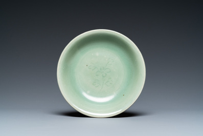 A Chinese Longquan celadon 'lotus' bowl and a dish, Song or later