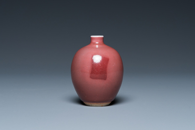 A small Chinese monochrome copper-red-glazed vase, Xuande mark, 19th C.