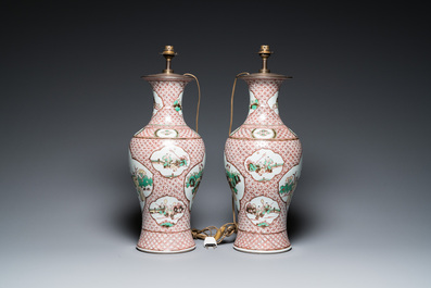 A pair of Chinese wucai vases with figurative design, 19th C.