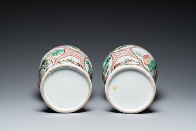 A pair of Chinese wucai vases with figurative design, 19th C.