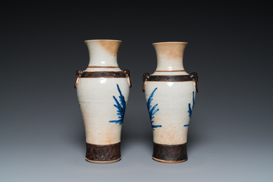 A pair of Chinese famille verte vases with covers and a pair of Nanking vases, 19th C.