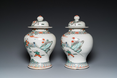 A pair of Chinese famille verte vases with covers and a pair of Nanking vases, 19th C.