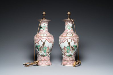 A pair of Chinese wucai vases with figurative design, 19th C.