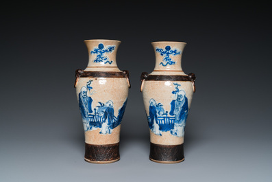 A pair of Chinese famille verte vases with covers and a pair of Nanking vases, 19th C.