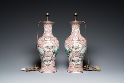 A pair of Chinese wucai vases with figurative design, 19th C.