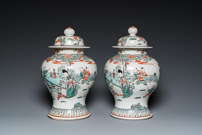 A pair of Chinese famille verte vases with covers and a pair of Nanking vases, 19th C.
