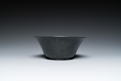 A Chinese dark moss green jade bowl, Qing