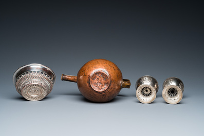 Two Tibetan silver stem bowls, a silvered bowl and a copper 'sengmaohu' ewer, 17/19th C.
