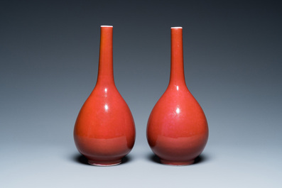 A pair of Chinese monochrome copper-red bottle vases, 19th C.