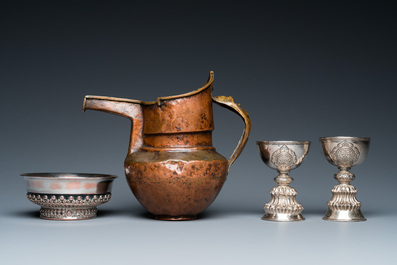 Two Tibetan silver stem bowls, a silvered bowl and a copper 'sengmaohu' ewer, 17/19th C.