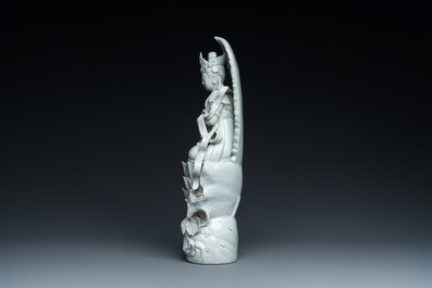 A Chinese Dehua blanc de Chine sculpture of Guanyin on a lotus throne, 19/20th C.