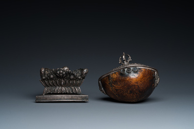 A Tibetan ritual silver-, coral- and turquoise-mounted 'kapala' or skull-bowl, 19th C.