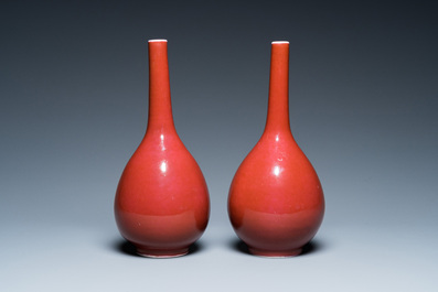 A pair of Chinese monochrome copper-red bottle vases, 19th C.