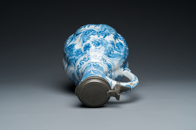 A large twisted Dutch Delft blue and white pewter-mounted ewer, 17th C.