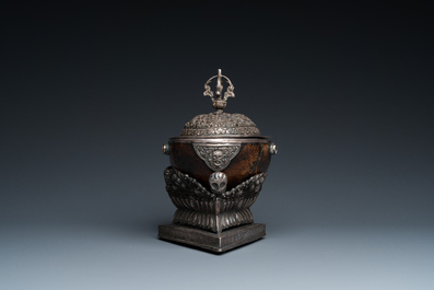 A Tibetan ritual silver-, coral- and turquoise-mounted 'kapala' or skull-bowl, 19th C.