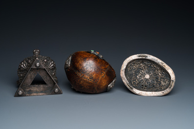 A Tibetan ritual silver-, coral- and turquoise-mounted 'kapala' or skull-bowl, 19th C.