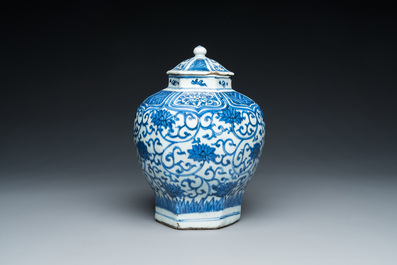 A Chinese hexagonal blue and white 'lotus scroll' vase and cover, Wanli