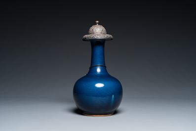 A Chinese monochrome blue-glazed kendi with silvered copper mounts, Qianlong