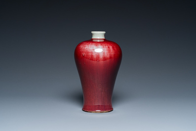 A Chinese peachbloom-glazed 'meiping' vase on wooden stand, 19th C.