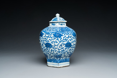 A Chinese hexagonal blue and white 'lotus scroll' vase and cover, Wanli