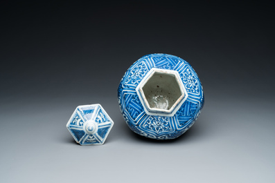 A Chinese hexagonal blue and white 'lotus scroll' vase and cover, Wanli