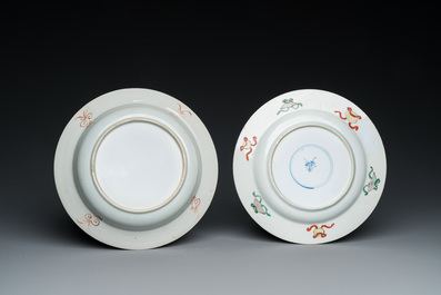 A Chinese famille verte 'antiquities' plate and a famille rose 'flower basket' plate, Kangxi and Qianlong