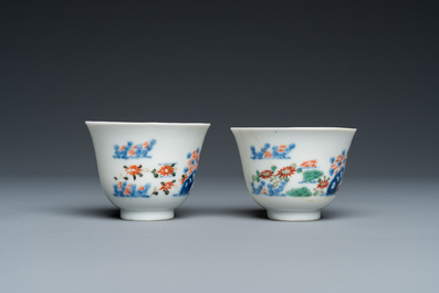 A pair of Chinese famille verte 'grasshopper' teacups, Kangxi mark but probably laer