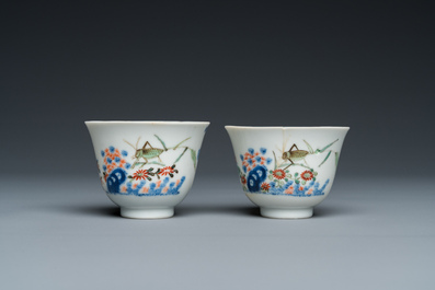 A pair of Chinese famille verte 'grasshopper' teacups, Kangxi mark but probably laer