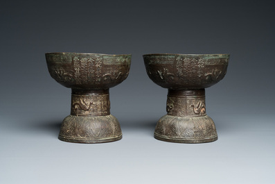 A pair of documentary bronze 'Dou' ritual vessels, Chenghua, dated in accordance to 1480