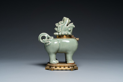 Een Chinese Longquan celadon wierookbrander in de vorm van een luduan met vergulde bronzen montuur, Ming